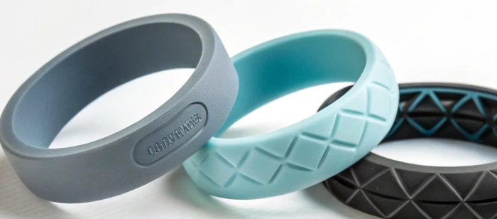 Modern silicone wedding bands in different textures and finishes, showing market evolution and design trends in silicone wedding bands
